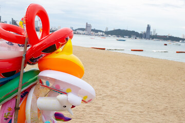 Colourful swim ring on Pattaya beach in Thailand.