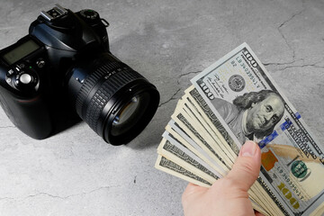 digital camera and money, store selling photographic equipment, pawnshop