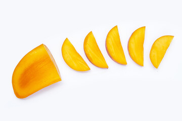 Mango fruit slices on white background.