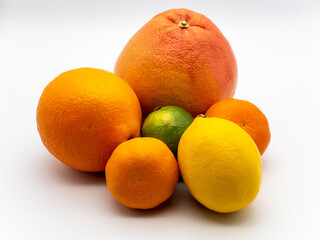 assorted citrus fruits on white
