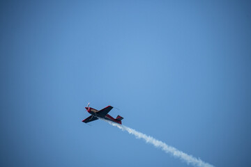 aerobatics on sports planes over the sea in the sky of Jordan