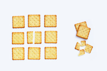 Dry cracker cookies on white background.