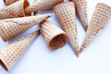 Empty ice cream cone on white background.