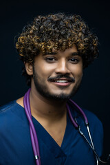 Close up of professional Medical doctor or nurse protective medical facial mask in dark room. Concept of covid-19 pandemic hope concept.