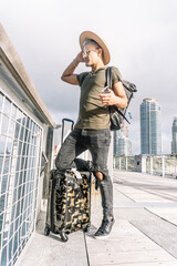 Full length of a traveller young man, taking the time to explore the city