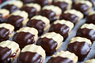 Homemade Christmas cookie dipped in chocolate, close up