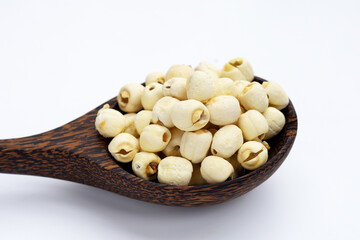 Dried lotus seeds on white background.