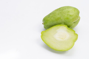 Fresh chayote fruit on white background.