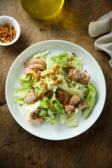 Homemade chicken salad with crunchy onion
