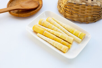 Bamboo shoots on white background.