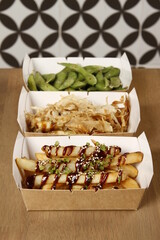 Japanese snacks - french fries with nagoya red miso sauce, frech fries with okonomiyaki sauce, and...