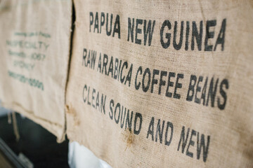 burlap fabric cloth with signage used to sell coffee beans