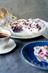 Still life of homemade casserole or pudding with blueberry