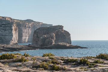 Fototapeta na wymiar Nice cliffs in Gozo with the beautiful blue sea. 