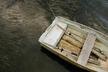 closeup shot of a parked white row boat