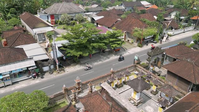Drone shot of Indonesian housing and road in Batubulan, Gianyar, Bali