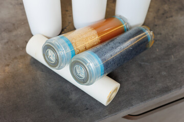 Replaceable cartridges in the water filter system. Water filtration system with replaceable...