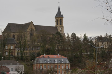 Church Notre-Dame de l'Assumption, local landmark is situated on a hill over the town. On the...