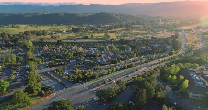 Aerial: Flying over Sandhill Road and the 280 Freeway, home of venture capital firms. Menlo Park, Silicon Valley. 