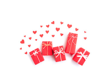 Red gift boxs with bow and Red papercut heart shapes  isolated on white background