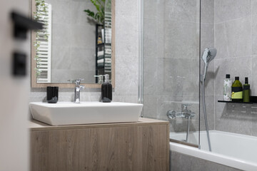 Grey bathroom of modern apartment