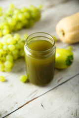 Healthy green smoothie with grape