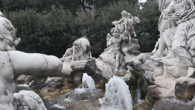ancient stone fountain in the garden of the royal palace of Caserta, italy