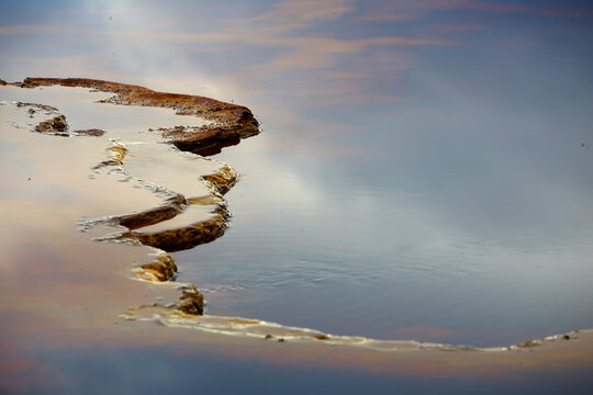 Detail of mineral deposit in Rio Tinto river in Minas de Rio Tinto mining area, Huelva province, Andalusia, Spain