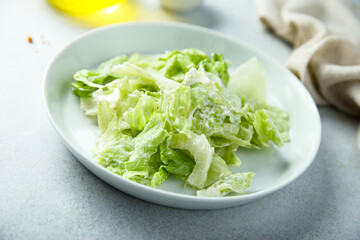 Healthy leaf salad with yogurt dressing