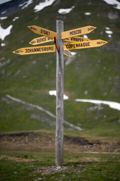 An international streetside sign near the border between Italy and France on the Col du St. Bernard, France.