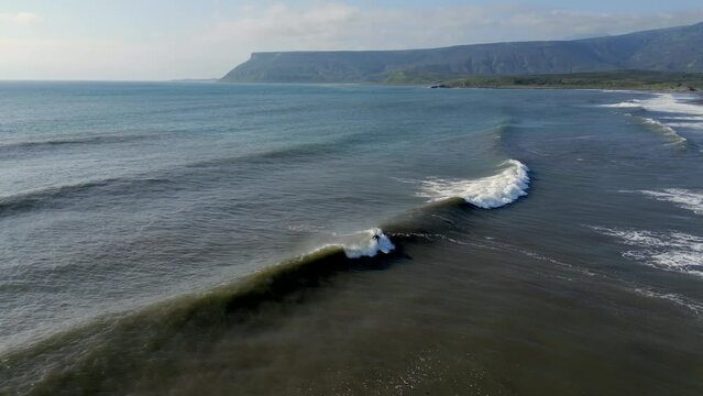 Drone view waves on the ocean sea stock clips. froth from the shore.