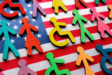 US flag and multi-colored figures with the symbol of a disability person.