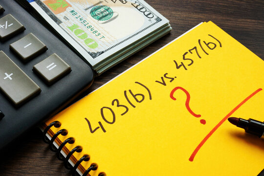 Notebook with choosing between retirement plans 403b or 457b.