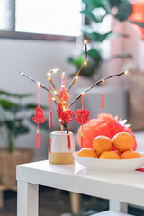 Decorated flat putting traditional pendant to the red Chinese New Year Celebrations for good luck. chinese word means blessing