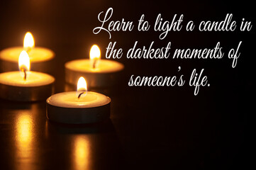 Learn to light a candle in the darkest moment of someone's life quote with candle light background....