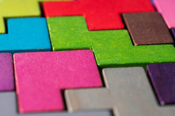 Geometric shapes on a wooden background.
