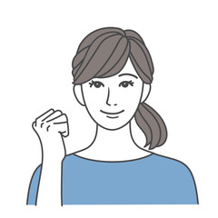 笑顔でガッツポーズをする女性 青