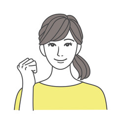 笑顔でガッツポーズをする女性 イエロー