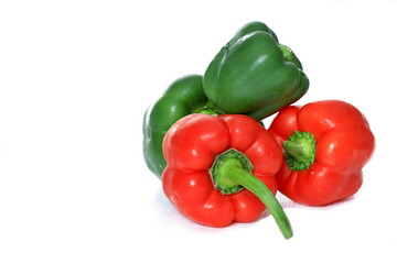 red and green peppers with white background no people stock photo