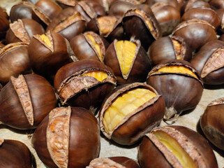 pile of tasty roasted chestnuts close up