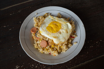 fried rice with side dish of omelet