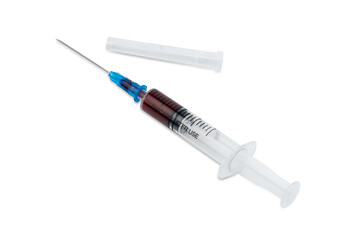 Fototapeta premium A syringe with blood for a blood test. Medical syringe with dark liquid. Drugs. Vitamins. Medicines.