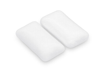 Three pieces of white chewing gum isolated on white. The whole subject is in focus.