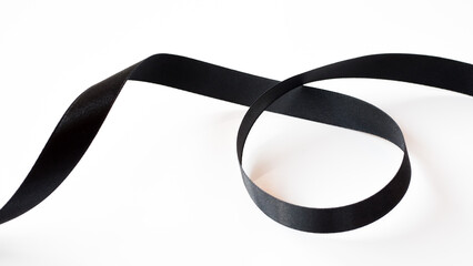 Abstract shape black ribbon isolated on white background.