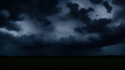 Fototapeta na wymiar Black storm clouds at night, Dark sky, and black clouds have high contrast.