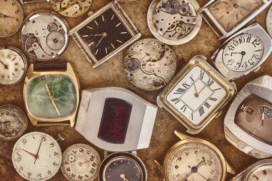 Collection of vintage rusty watches and parts