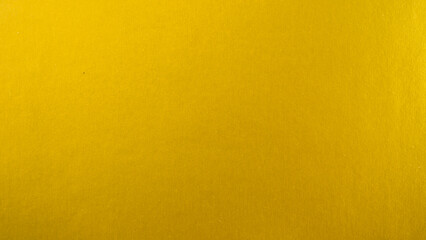 Gradation gold foil leaf shiny with sparkle yellow metallic texture background.
Abstract paper glitter golden matt glossy for template.
top view.