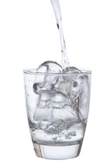 pour water in glass with ice  isolated on white background clipping path