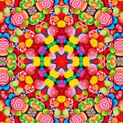 Fototapeta na wymiar A colorful kaleidoscope with all the colors of the rainbow. Geometric spectacular mosaic background.