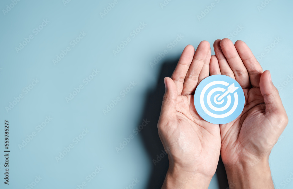 Aufkleber business hands holding target icon, dartboard and arrow for creative and set up business objective t